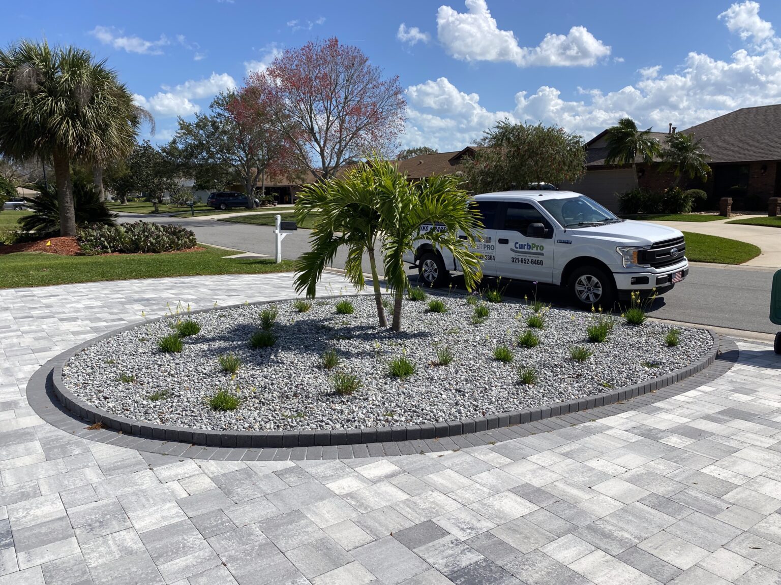 Decorative concrete landscape curbing installed by Curb Pro